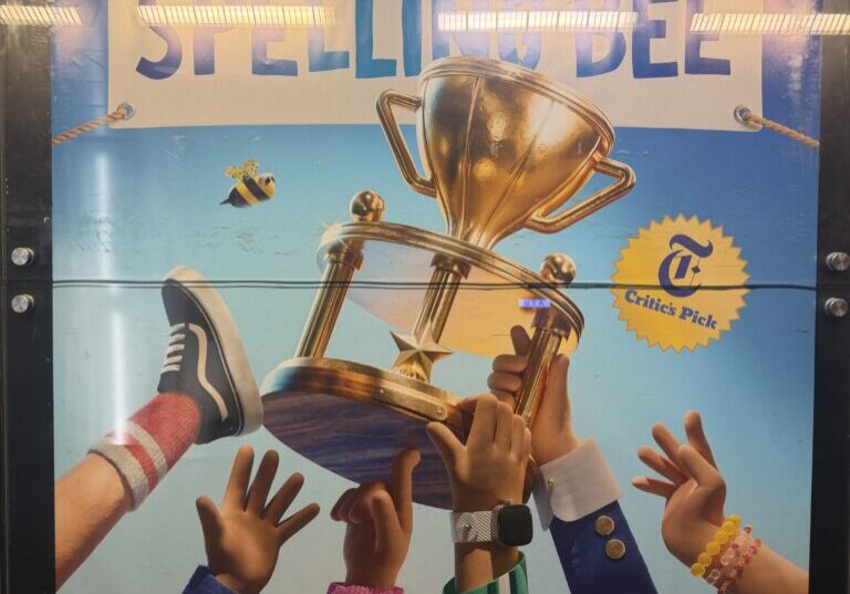 Spelling Bee poster showing trophy and hands